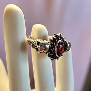 Edgy Silver Skull Ring with Red Accent
